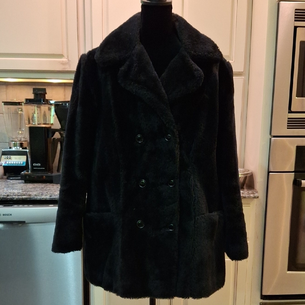 "Vintage"Black Faux fur Double breasted Lapeled and heavy lined Coat. No tags